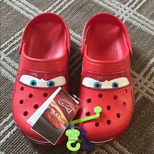New with Tags CROCS Size 12 Red Lightning McQueen Disney shoes